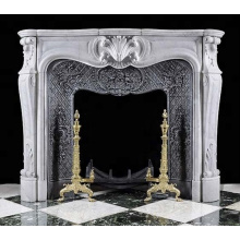 Indoor carved cultured marble fireplace surround